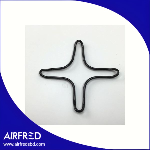 Reducción de rejilla universal para hornilla de cocina con cuatro puntas esmaltadas.